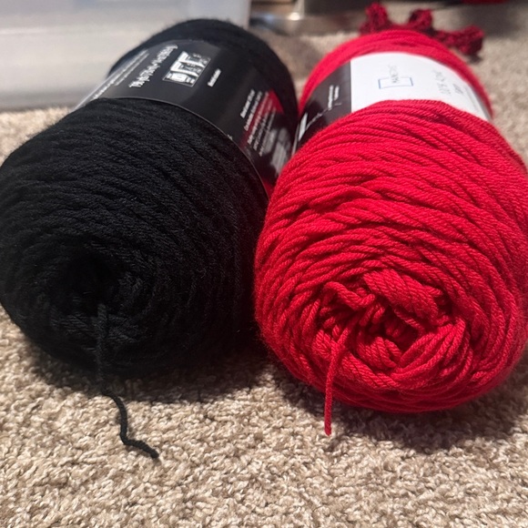 2 large unused skeins of Mainstays Acrylic Yarn (one black, one red) - Picture 4 of 4